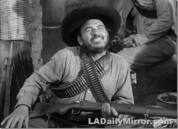 Man with rifle and cartridge belts. Also a hat. Man with rifle and cartridge belts. Also a hat.