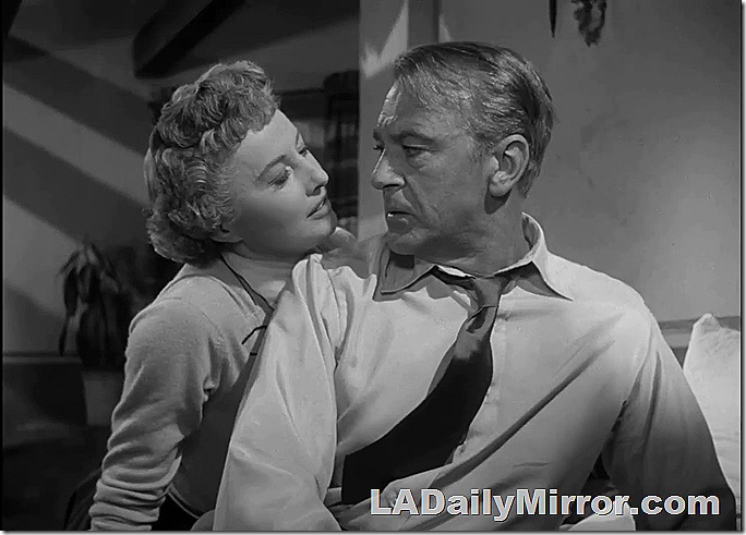 Woman leaning close to man. He looks concerned. Woman leaning close to man. He looks concerned.