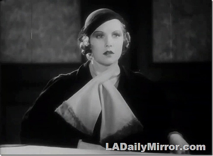 Elegant woman in hat and scarf