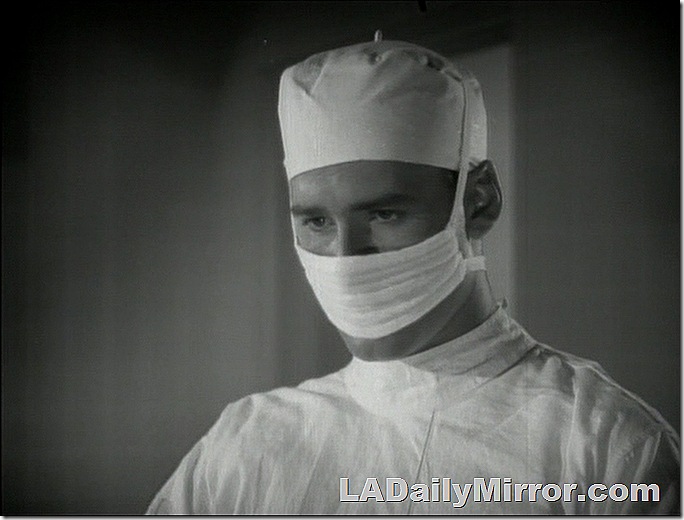 Man in surgical garb. 