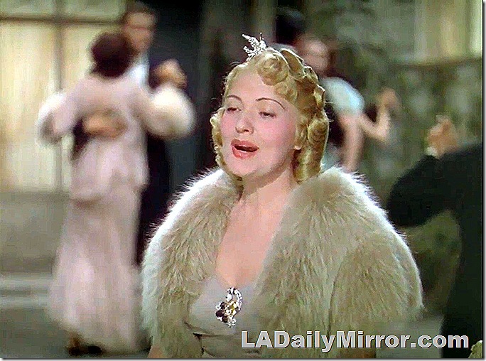 Elegant woman in fur wrap. 