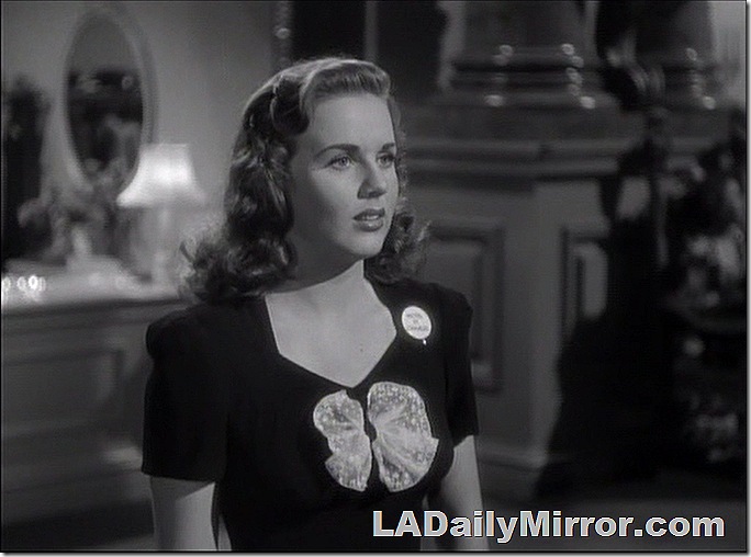 Woman with shoulder-length dark hair.