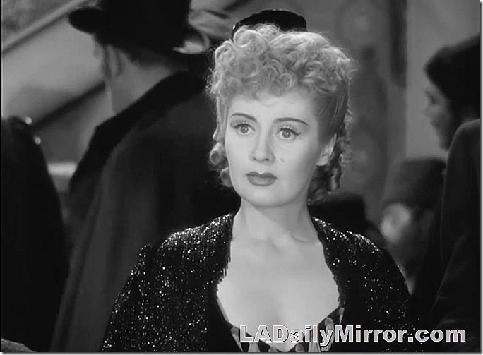 Elegant lady in sparkly wrap. 