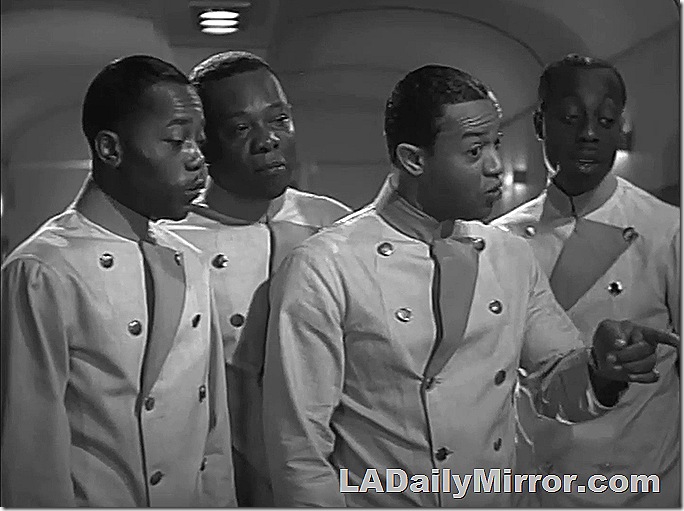 Four man in matching uniforms