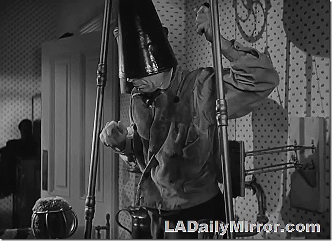 Man with mysterious object over his head. What is going on here? 