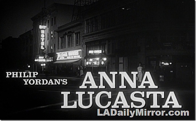 Main title: Lettering over night shot of street scene with neon signs. 