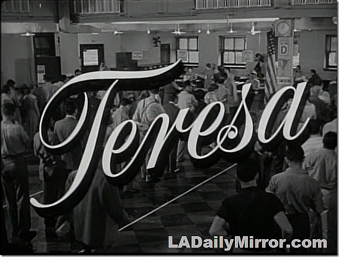 Script over shot of unemployment office with people standing in line. 