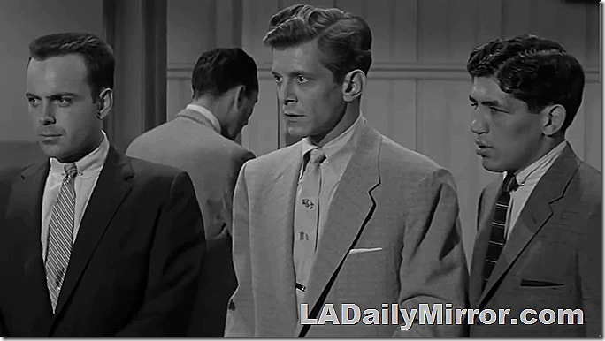 Three young toughs in suits