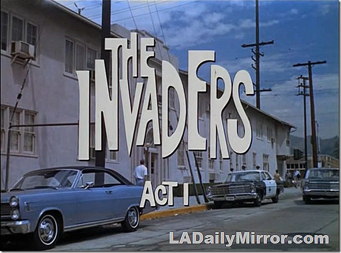 The Invaders. Main title over streetscape showing two-story building and a vintage police car. The Invaders. Main title over streetscape showing two-story building and a vintage police car.
