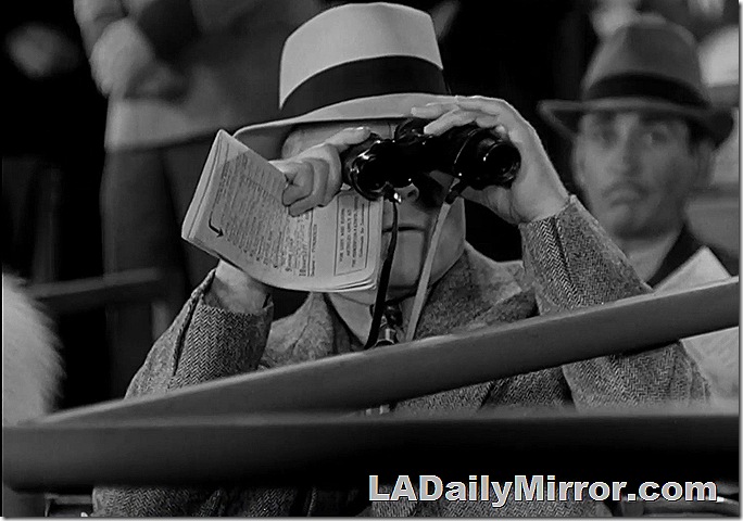 Mysterious fellow with binoculars, probably betting on Lucky Dan to place. 