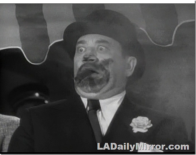 Man with shocked expression because the cigar he was smoking just exploded. 