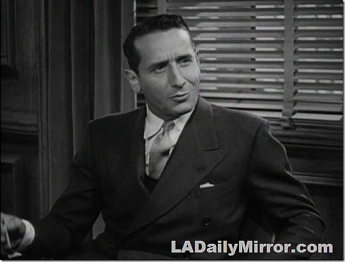 Man in double-breasted suit with wide lapels