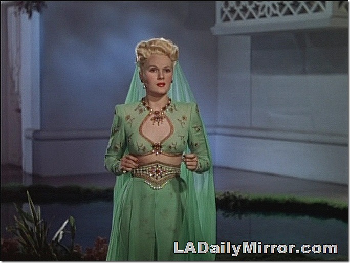 Woman in elaborate Arabian fantasy costume. Woman in elaborate Arabian fantasy costume.