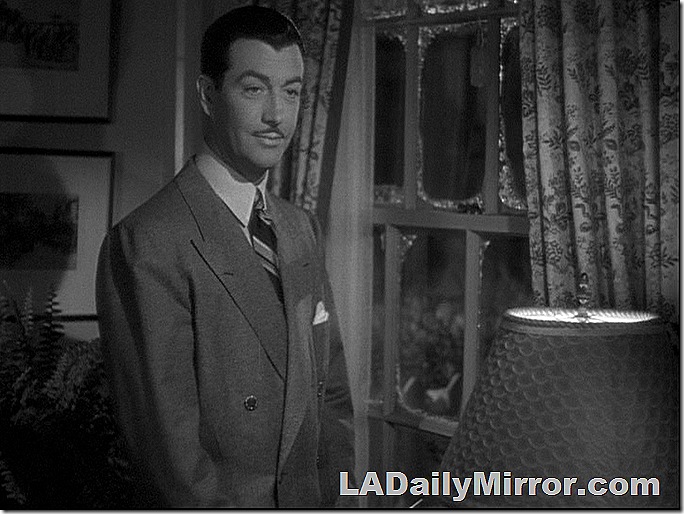 Man with mustache, in double-breasted suit and tie. Man with mustache, in double-breasted suit and tie.