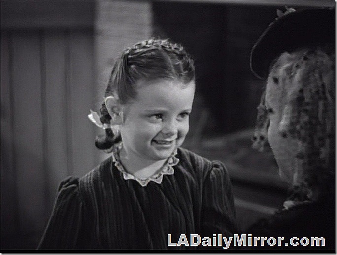 Young girl with a braid hair across the top of her head. Young girl with a braid hair across the top of her head.