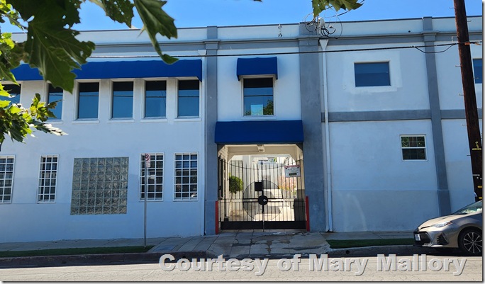Occidental Studios Main Building, showing an entrance gate in a two-story structure. 