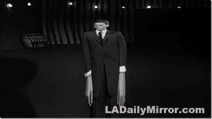 Man reflected in funhouse mirror