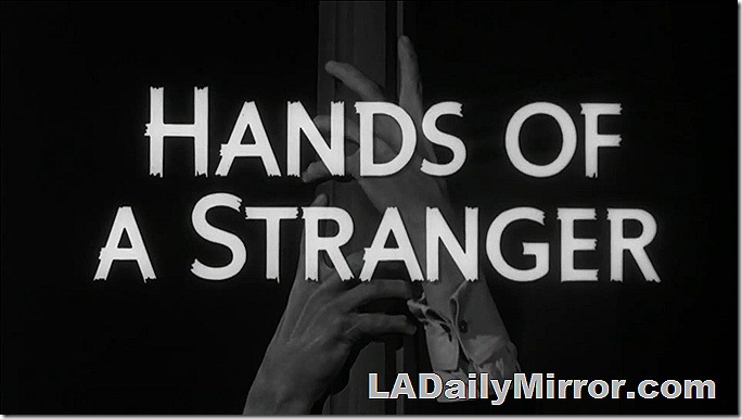 Main Title: Lettering over shot of a pair of hands on a light pole. 