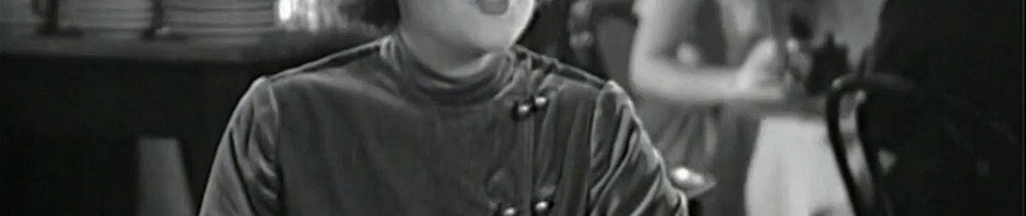 Mysterious woman sitting at a table