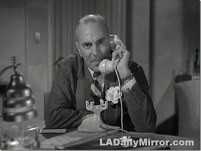 Peevish man on phone. 