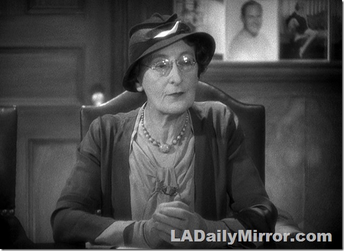 Woman in glasses and a hat. 