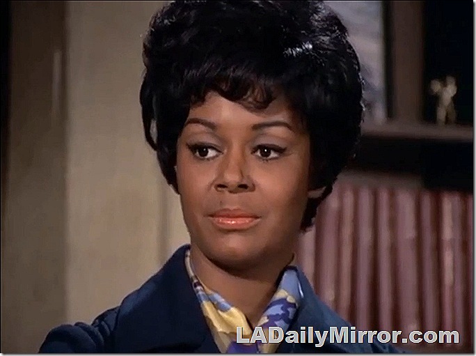 Woman with short hair, a kerchief or scarf around her neck. Woman with short hair, a kerchief or scarf around her neck.