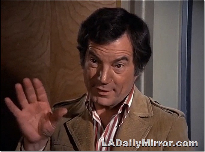 Man with corduroy jacket, open collared shirt and medium-length hair. Man with corduroy jacket, open collared shirt and medium-length hair.