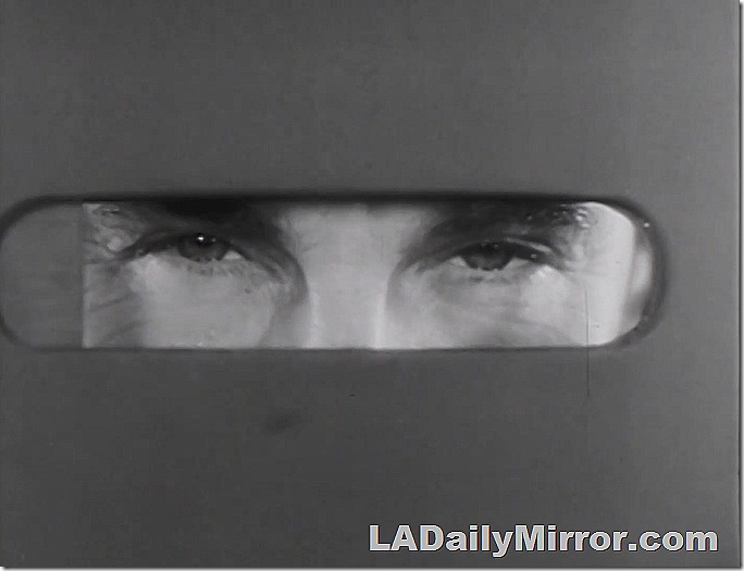 Eyes looking out of a peephole