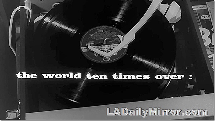 Main title: Lettering over photo of record player. Main title: Lettering over photo of record player.