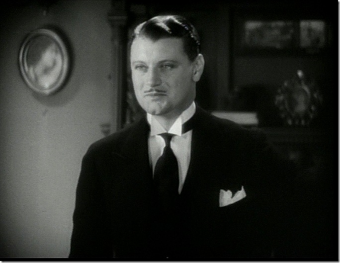 Man with wing collar and slight mustache. Man with wing collar and slight mustache.