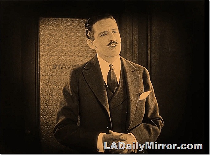 Man with mustache in three-piece suit. Man with mustache in three-piece suit.