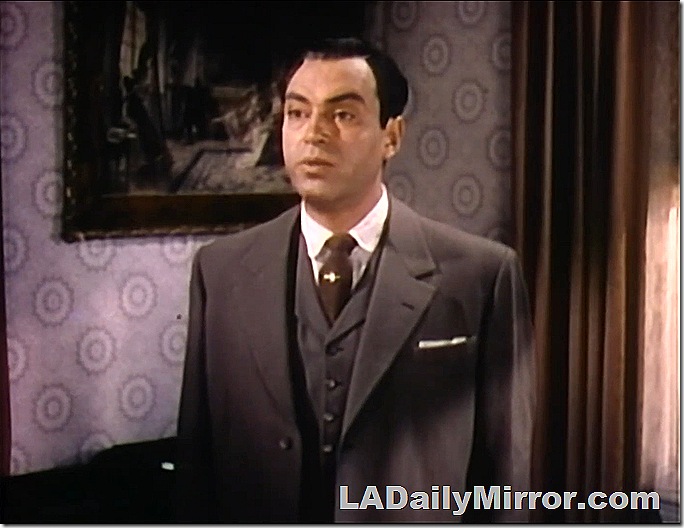 Man in tie, coat and vest. 