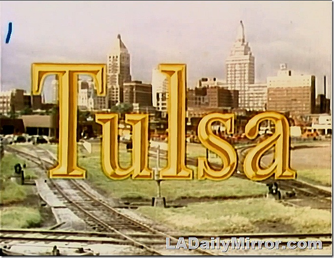 Main title: Lettering over image of Tulsa skyline. 