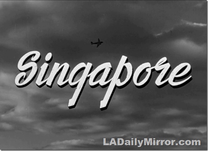 Main title: Lettering over shot of clouds with airplane. 
