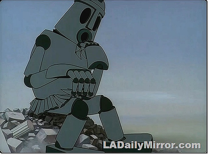 A large robot sits on the rubble of a destroyed building. 