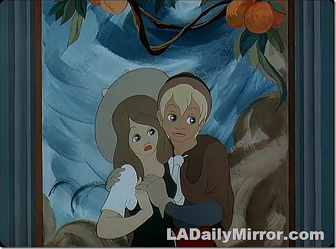 Young couple. She wears a hat. They are holding hands. 