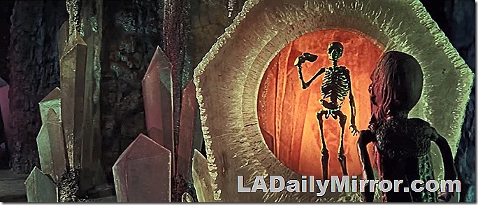 Skeleton and weird creature looking at it 