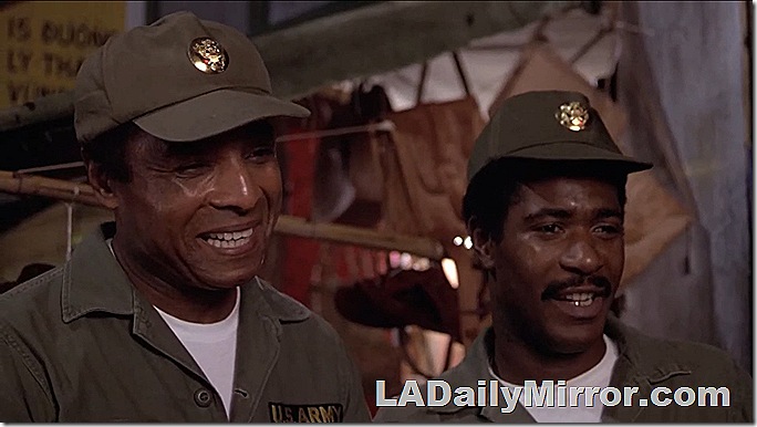 Two men in U.S. Army uniforms. 