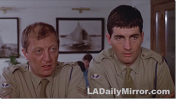 Two men in uniform at a bar