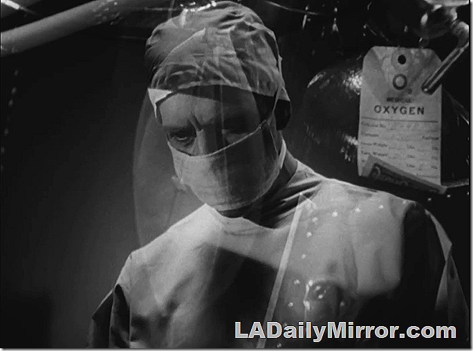 Mysterious doctor in surgical gown, with a montage of surgical equipment. His face is masked and he's wearing a cap. 