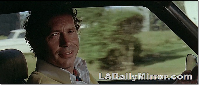 Man driving car, shot from passenger seat. Man driving car, shot from passenger seat.