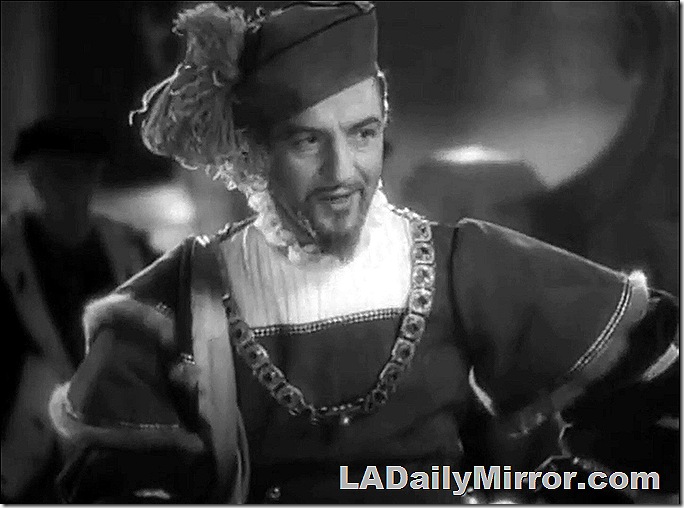 Man with a Van Dyke beard, in elegant hat and robe