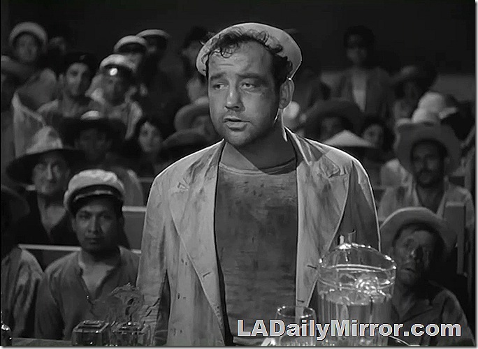 Man in dirty clothes and a sailor's cap. 