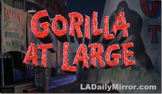 Main Title: Scary red letters over background of amusement park and image of Goliath the Gorilla. 