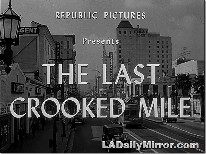 Main title: Lettering over shot of Hollywood Boulevard showing traffic and the Pantages Theater. 